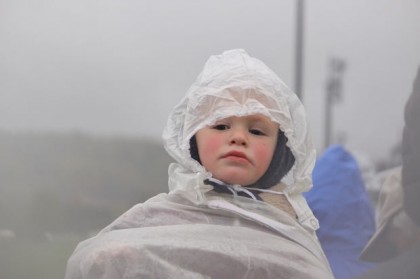 kid in raincoat