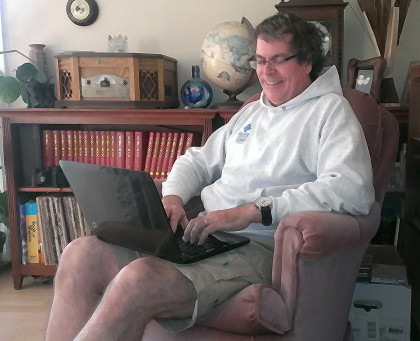 Photo of Robb Lightfoot on his laptop