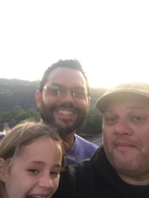 Brothers Mike Wetzel (center) and Chris Adey spent Thanksgiving together with their families. Mike was killed in the San Bernadino terrorist attack. 