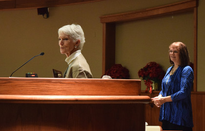 Outgoing Mayor Francie Sullivan talks about her love of Redding as the new mayor, Missy McArthur, looks on. Photo by Jon Lewis.