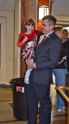 McElvain holds his daughter, Pepper.