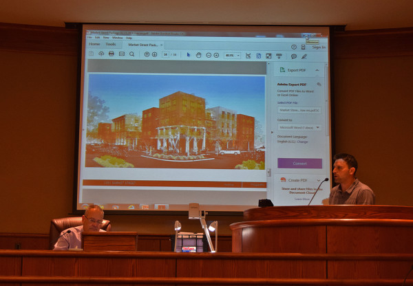 Daniel Knott of K2 Land & Investments, right, discusses plans to replace the old Dicker's building and reopen Market, Butte and Yuba streets. Photo by Jon Lewis.