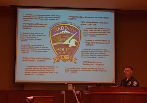 Redding Police Chief Rob Paoletti uses news reports to point out the NPU's success. Photo by Jon Lewis.