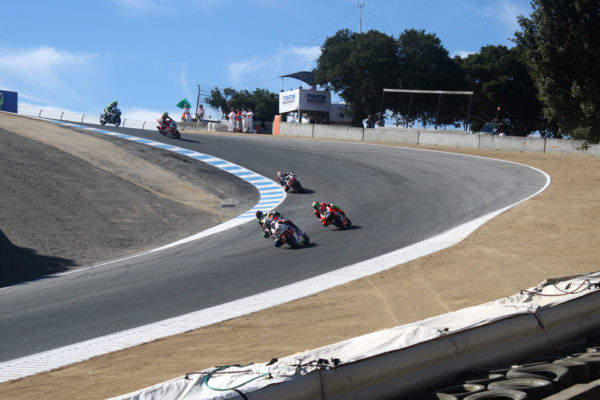 Nicky Hayden leads Davide Giuguiano through the corkscrew.